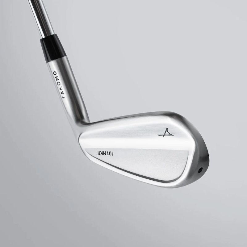 Takomo 101 MKII iron, showing the satin clubhead, back cavity and Takomo branding on the hosel.